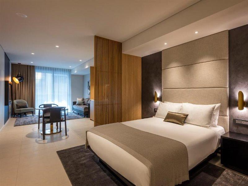 Skye Suites Sydney Ngoại thất bức ảnh A bedroom at the hotel